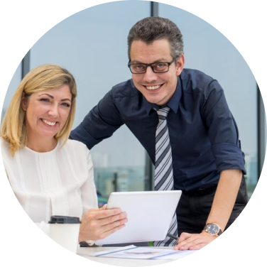 Two people discussing over a document